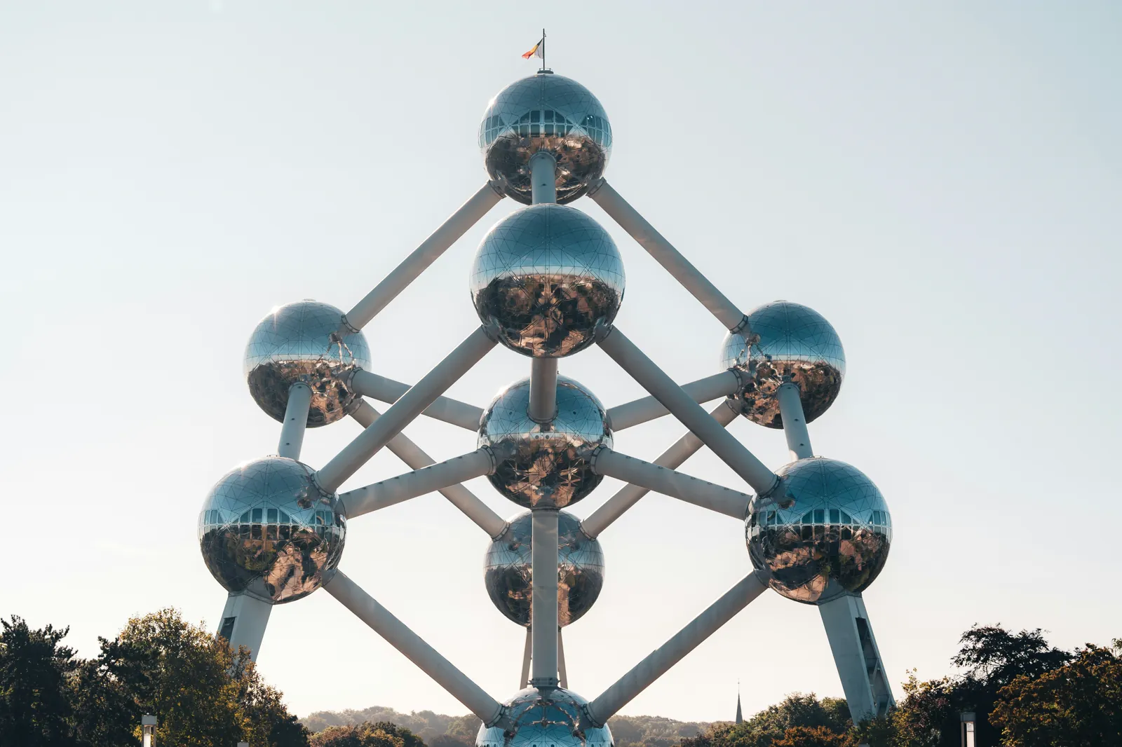 Interconnected structural forms viewed against the sky.